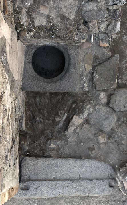 Room d, cistern mouth in the SW part of the room.